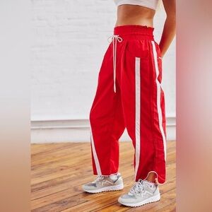 FP Movement Champ is Here Red Track Pants with White Stripes